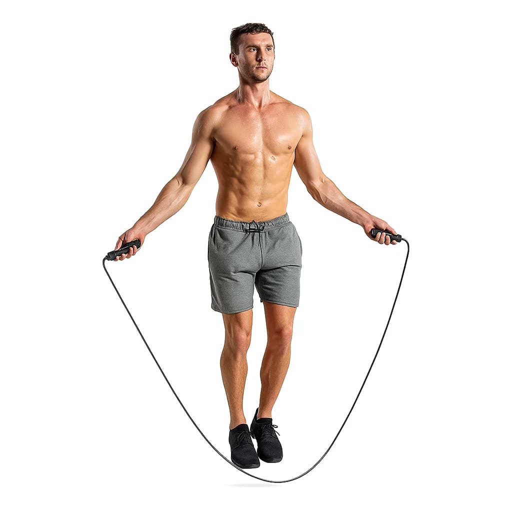 Man using SwiftRope – High-Speed Jump Rope for fitness training during cardio workout.